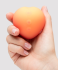 Womanizer Peach Toy Pleasure Air stimulateur de clitoris chez Amorana livraison incluse